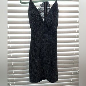 Black Dress with Lace detail on the back.